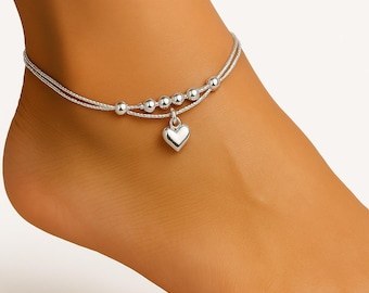 Fotlänk i sterlingsilver med hjärtformad berlock: Elegant fotledsarmband med pärlor