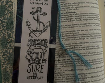 May include: A black and white bookmark with a hand-drawn anchor and the text "Hope we have as an anchor of the soul both sure & steadfast Hebrews 6:19".