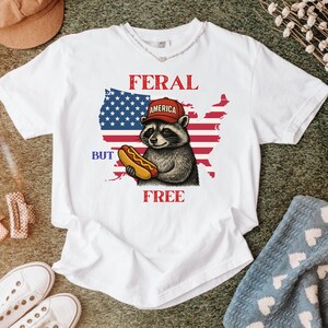 Chemise raton laveur sauvage mais gratuit, t-shirt drôle du 4 juillet, chemise patriotique, t-shirt graphique américain, vintage, animal, jour de l'indépendance, unisexe, cadeau