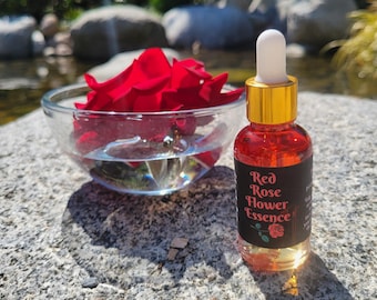 Röd rosblommaessens