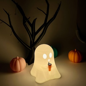 Ghost with 13 LED colors. Cute spooky decor. Great gift or office desk decoration. Fun night light for kids to select their favorite colors