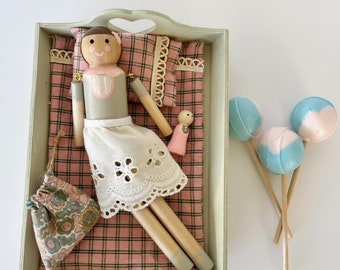 Vintage style wooden doll with movable arms and legs