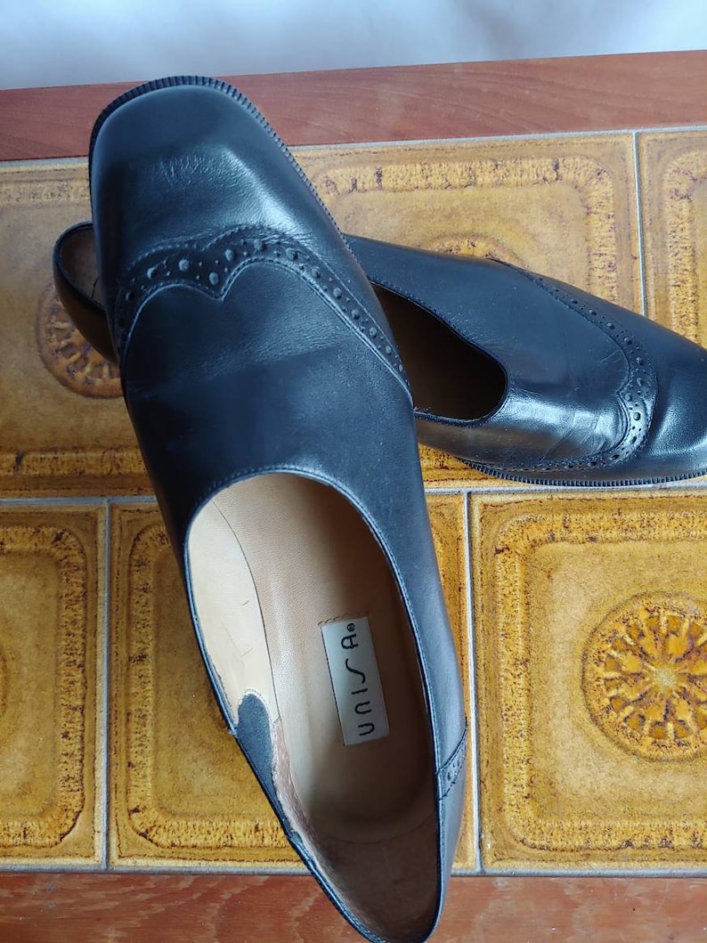 Unisa black leather slip on shoes low heel size 8