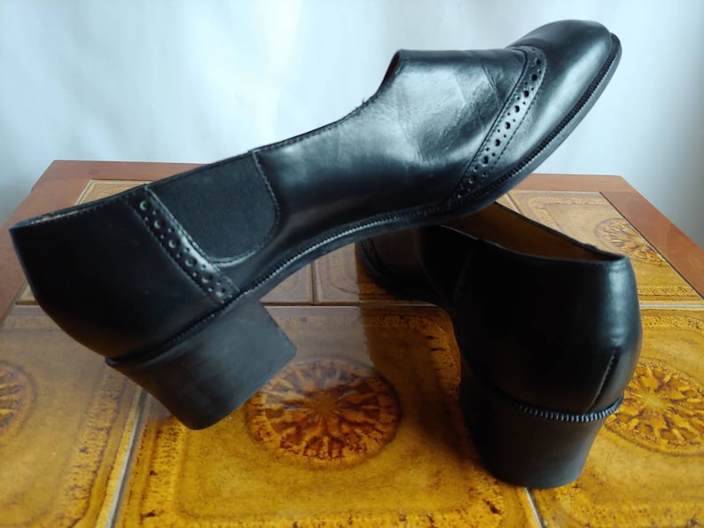 Unisa black leather slip on shoes low heel size 8