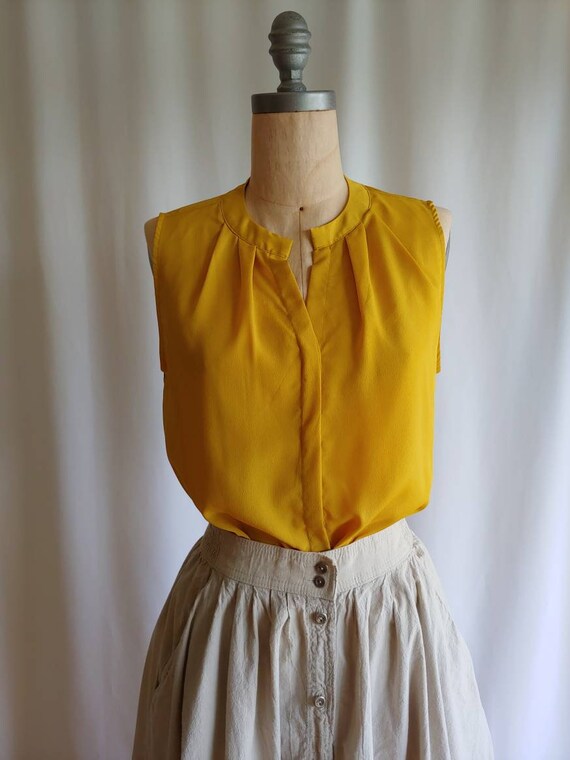 yellow flowy top
