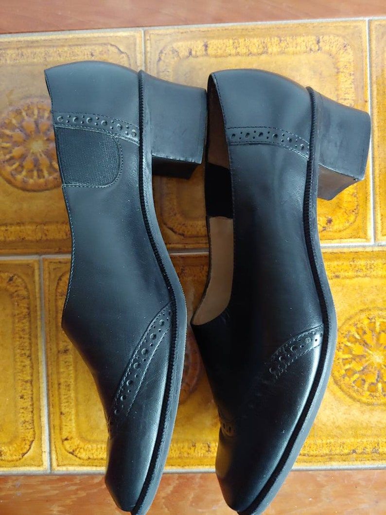 Unisa black leather slip on shoes low heel size 8