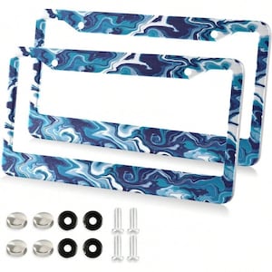 May include: Two rectangular license plate frames featuring a swirling marble pattern in shades of navy blue, light blue, and white. The set includes eight small silver-toned metal screw caps, four black rubber washers, and four silver metal screws.