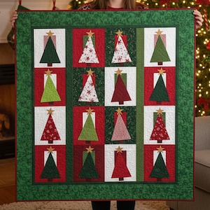 May include: A Christmas-themed quilt featuring a grid of squares with Christmas tree designs. The trees are in various colors and patterns, including green, red, and white, and are topped with gold stars. The quilt has a green border and red accents.