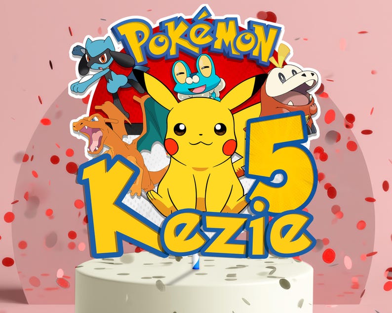 May include: A cake topper featuring the word "Pok&eacute;mon" above a collection of cartoon characters, including Pikachu. The number "5" and the name "Kezie" are also displayed. The design is set against a pink background with red confetti.