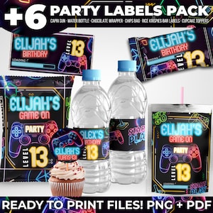 Puede incluir: Un paquete de fiesta con etiquetas para Capri Sun, botellas de agua, envoltorios de chocolate, bolsas de patatas fritas, barritas de arroz inflado y adornos para cupcakes. Las etiquetas presentan un tema de juego de neón con el texto "Elijah's Birthday Level 13".