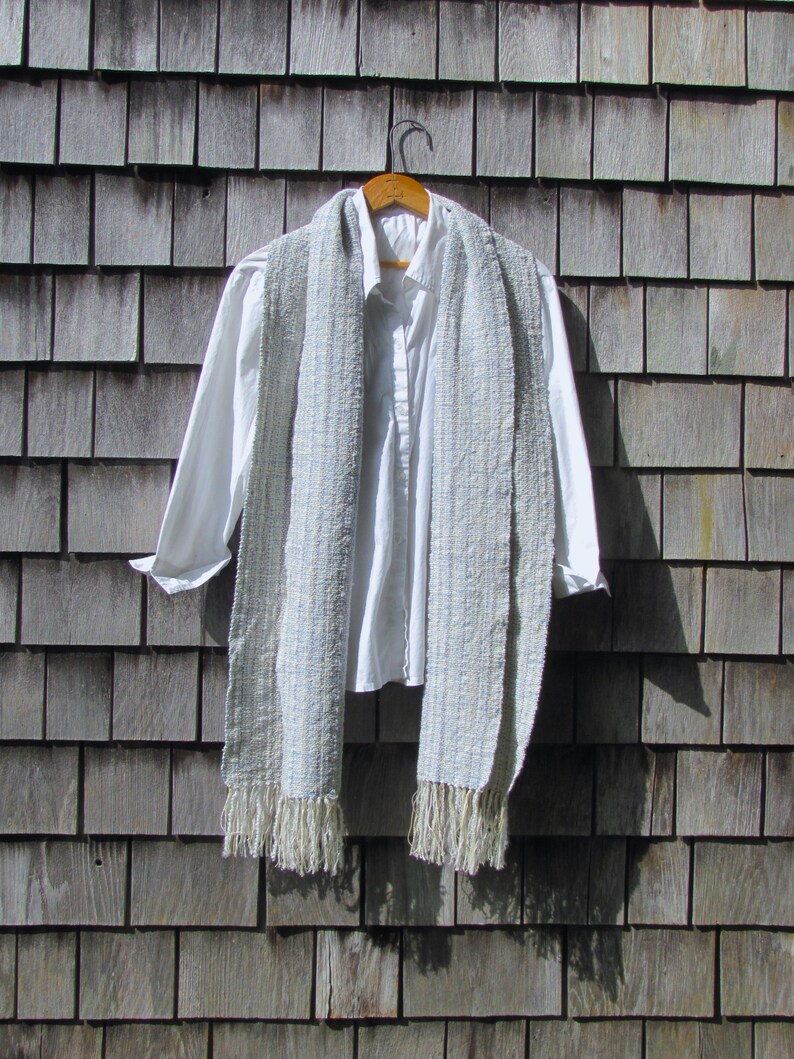 Handmade Light Blue Chalcedony Artisan Hand Woven Scarf Shawl or Table Runner for Positive Natural Energy, Spiritual Serenity, Harmony, Grounding Meditation Prayer is a Gender Neutral Unisex Men's Women's Long Fall, Winter, Spring, Urban Casual Rustic Fashion Accessory Wrap or Home Decor Accent Handcrafted by Amy C. Lund in Cotton Blend. Styled with a white dress shirt.