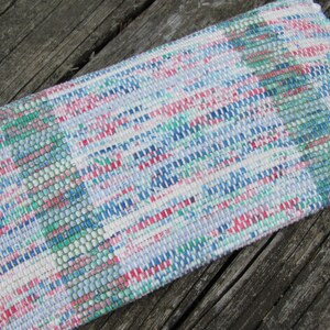 Upcycled Fabric Clutch Wallet, Boho Cloth Purse Pastel Wristlet Hand Bag, Handmade Hand Woven Zero Waste Sustainable Eco Vegan Recycled Accessories, Travel Jewelry Phone Pouch, Casual Spring or Summer Slow Fashion Accessory Handcrafted by Amy C. Lund in Pastel Pink, Green, Blue and Cream White with Button Accent. Reverse side.