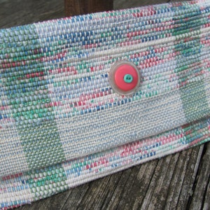 Upcycled Fabric Clutch Wallet, Boho Cloth Purse Pastel Wristlet Hand Bag, Handmade Hand Woven Zero Waste Sustainable Eco Vegan Recycled Accessories, Travel Jewelry Phone Pouch, Casual Spring or Summer Slow Fashion Accessory Handcrafted by Amy C. Lund in Pastel Pink, Green, Blue and Cream White with Button Accent.