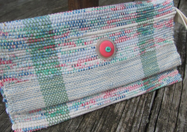 Upcycled Fabric Clutch Wallet, Boho Cloth Purse Pastel Wristlet Hand Bag, Handmade Hand Woven Zero Waste Sustainable Eco Vegan Recycled Accessories, Travel Jewelry Phone Pouch, Casual Spring or Summer Slow Fashion Accessory Handcrafted by Amy C. Lund in Pastel Pink, Green, Blue and Cream White with Button Accent.