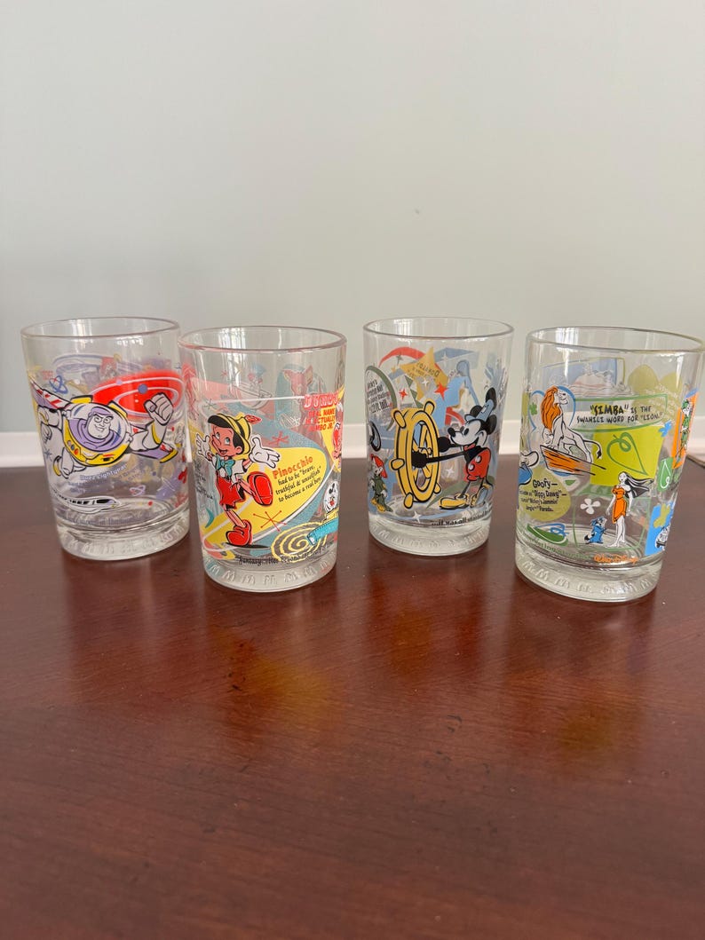 Vintage 2001 Walt Disney World 100 Years of Magic McDonalds Glasses Set of 4 Disney Collectible Tumblers Buzz Lightyear Mickey Mouse afbeelding 1