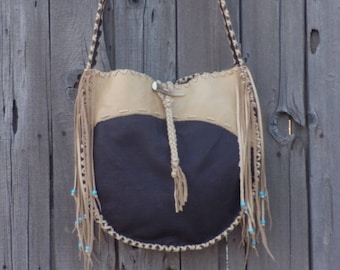 Leather handbag ,  Leather tote ,  Fringed crossbody bag ,  Designer handbag ,  Leather drum bag