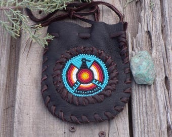 Leather medicine pouch , beaded Thunderbird neck bag