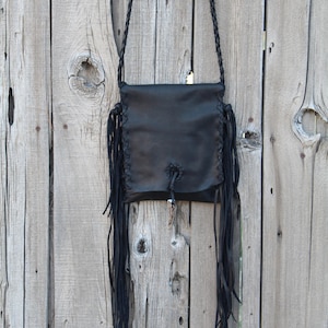 Fringed Leather Crossbody Bag: Black Boho Handbag with Antler Closure