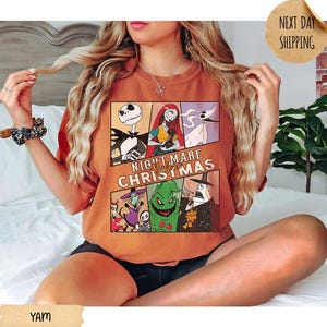 May include: A burnt orange short-sleeve t-shirt featuring a multi-panel graphic print of characters from The Nightmare Before Christmas, including Jack Skellington, Sally, Zero, and Oogie Boogie, with the movie title text centered in the design.