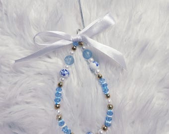 Blue floral print beaded phone strap