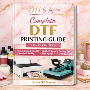 Puede incluir: Un libro titulado "Complete DTF Printing Guide for Beginners" de DTF by Jazmin. La portada presenta un diseño de mármol rosa con letras doradas e ilustraciones de una impresora y una prensa térmica. El libro promete un tutorial paso a paso.