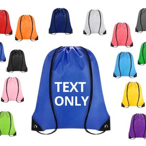 May include: A collection of drawstring backpacks in various colors, including red, orange, blue, white, pink, gray, green, black, light blue, yellow, and purple. The large blue bag has the text "TEXT ONLY" in white.