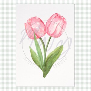 May include: Watercolor painting of two pink tulips with green leaves and stems. The artwork is on a white background with the text "DIGITAL STUDIO" in a circle. The background is a light green and white checkered pattern.
