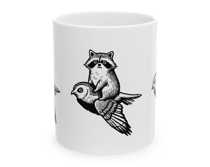 Raccoon & Bird Coffee Mug: Whimsical Ceramic Animal Cup
