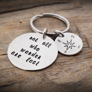 Sterling Silver Not All Who Wander Are Lost Key Chain on a Base Metal Split Ring