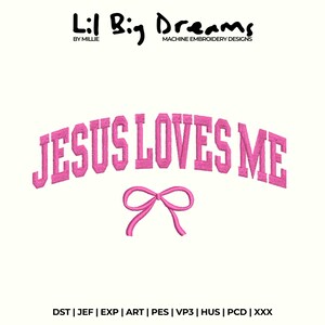 May include: A white background with the text "JESUS LOVES ME" in pink, arched above a pink bow. The text "Lil Big Dreams" and "MACHINE EMBROIDERY DESIGNS" are at the top. Embroidery design files are listed at the bottom.