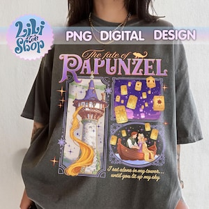 May include: Dark gray t-shirt featuring a colorful graphic design from the movie "Tangled". The design includes the text "The fate of Rapunzel", a tower, floating lanterns, and a boat with two people. The shirt also has the text "I sat alone in my tower... until you lit up my sky."