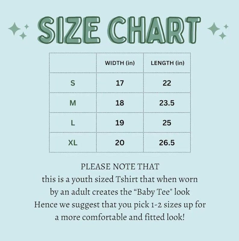 May include: A light blue size chart for a youth t-shirt with dark green text. The table lists sizes S, M, L, and XL with corresponding width and length measurements in inches. It includes a note about the fit for adults to achieve a baby tee look.