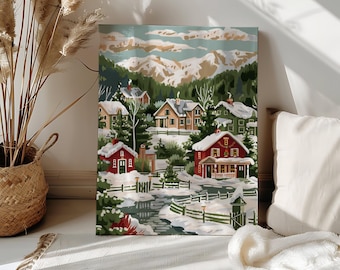 May include: A canvas print depicting a winter village scene. The artwork features snow-covered houses, evergreen trees, and a mountain range in the background. The color palette includes shades of red, green, white, and brown.