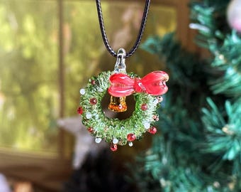 Handmade Glass Christmas Wreath Pendant Necklace – Festive Lampwork Glass Jewelry with Red Bow and Bell Charm, Stocking Stuffers