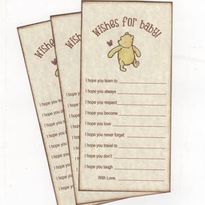 May include: A Winnie the Pooh themed baby shower card with a list of wishes for the baby. The card has a vintage look with a brown background and a Winnie the Pooh illustration.
