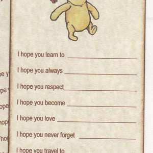May include: A Winnie the Pooh themed baby shower card with a fill-in-the-blank section for wishes. The card features a cartoon image of Winnie the Pooh walking with a butterfly.