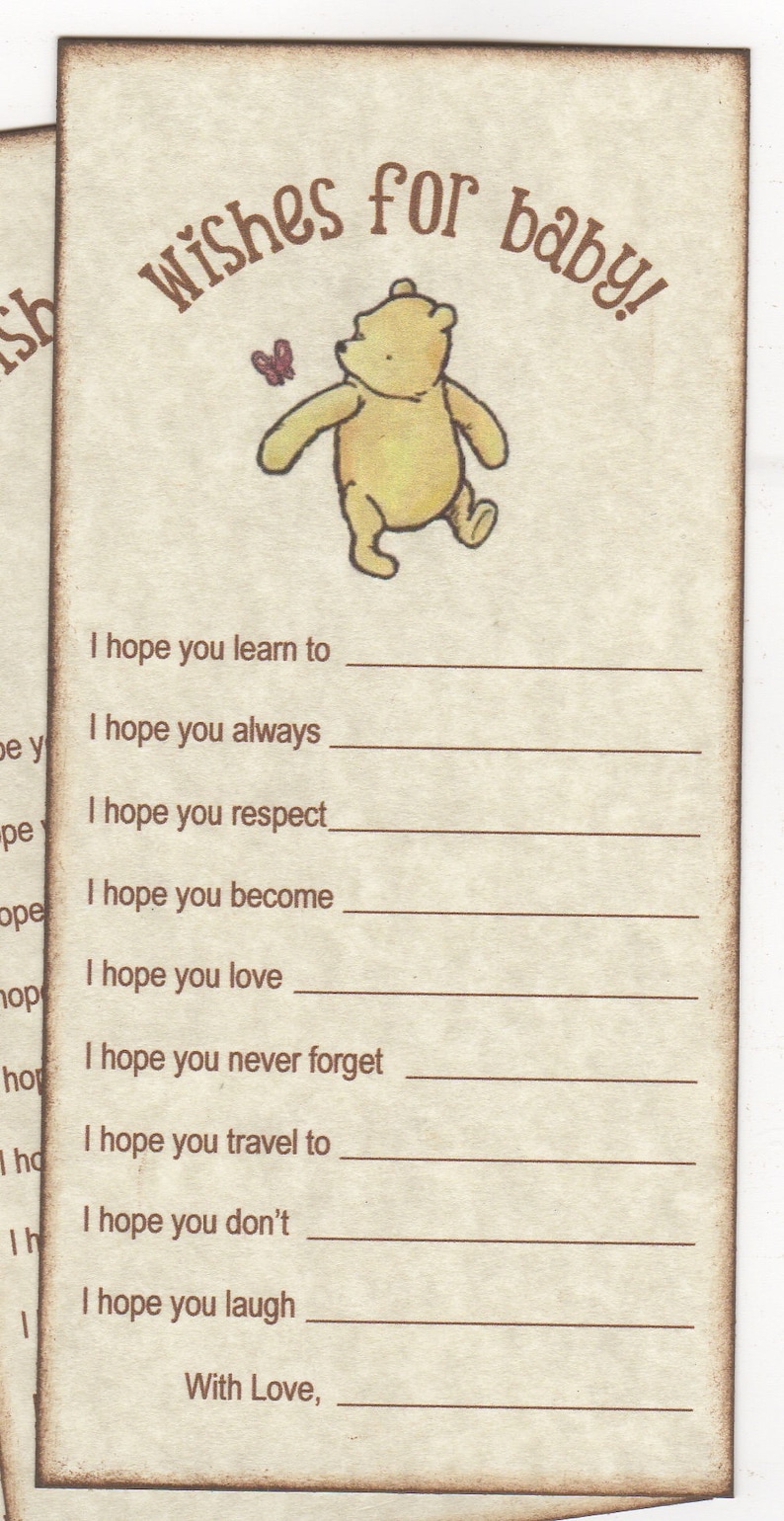 May include: A Winnie the Pooh themed baby shower card with a fill-in-the-blank section for wishes. The card features a cartoon image of Winnie the Pooh walking with a butterfly.