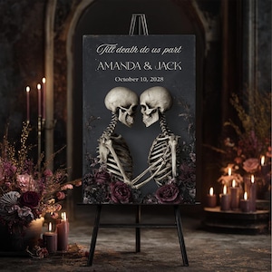 May include: A rectangular black sign on a black easel featuring the text Till death do us part, AMANDA & JACK, and October 10, 2028. The design includes two skeletons facing each other, surrounded by dark purple and black floral accents.