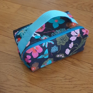 Pochette cousue main double zips