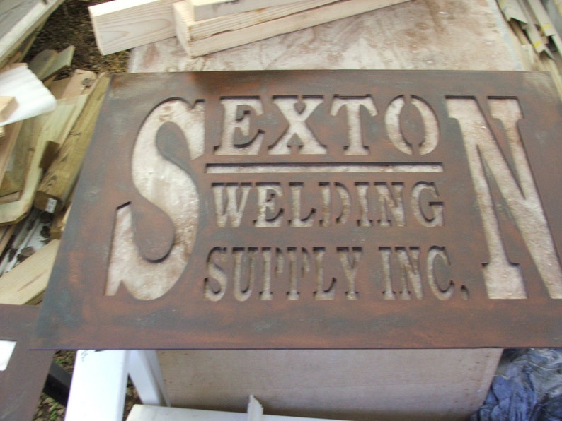 CNC plasma art cut sign in steel with raw iron rusted effect | Etsy