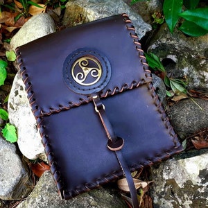 Leather belt bag with brass Triskell