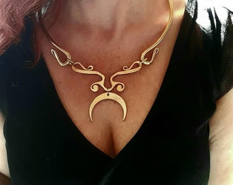 torque necklace with moon pendant