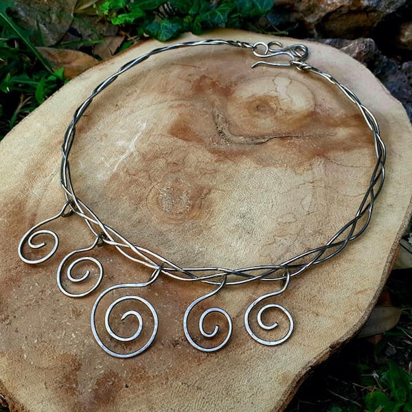 Braided necklace with spirals