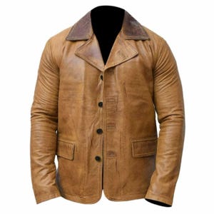 May include: A brown leather jacket with a contrasting brown collar. The jacket has a button-up front, two front pockets, and long sleeves. The leather has a distressed appearance.