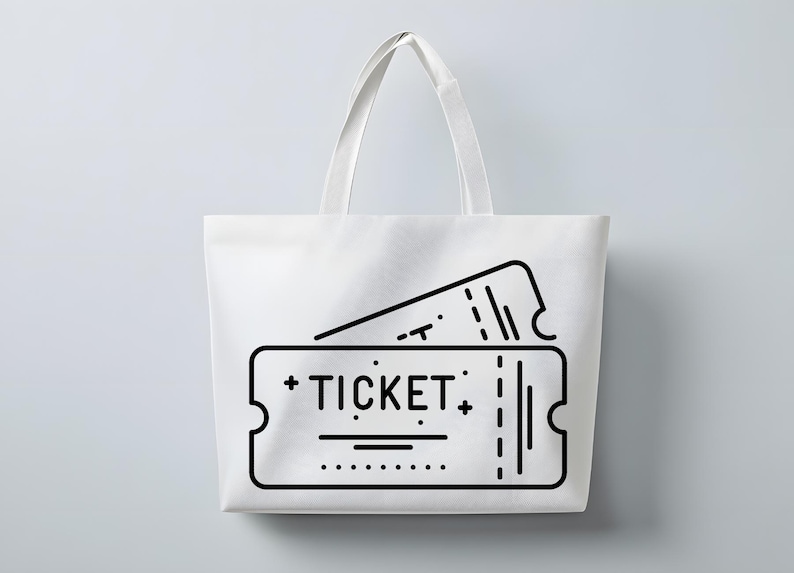May include: White tote bag with a black graphic of two tickets. The word "TICKET" is printed on the front ticket. The bag has two white handles and is set against a light grey background.