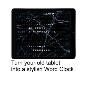 May include: A black tablet displays a word clock with white text against a dark, marbled background. The text reads "SONO, DODICI, PUNTO, OGGI È GIOVEDÌ, FEBBRAIO." The caption below says "Turn your old tablet into a stylish Word Clock."