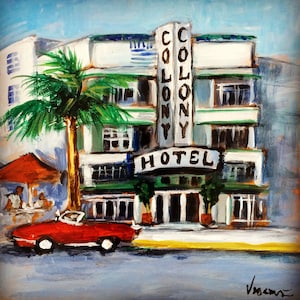 May include: A painting of a red convertible car parked in front of a white building with a green awning. The building has a sign that says "Colony Hotel" in black letters. There is a palm tree in front of the building.