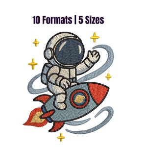 May include: An embroidered design featuring an astronaut riding a rocket ship through space. The astronaut is wearing a white spacesuit and helmet. The rocket is blue and red, with yellow flames. The text "10 Formats | 5 Sizes" is at the top.
