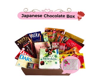 May include: A brown box overflowing with Japanese chocolate snacks. The box includes Pocky sticks, DARS chocolate bars, and various other chocolate treats. The text "Japanese Chocolate Box" is displayed above the box.