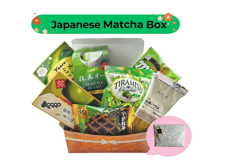 May include: A Japanese Matcha Box filled with various matcha-flavored snacks and treats. The box includes matcha au lait, tiramisu chocolate, matcha Baumkuchen, and other packaged goods. The box is made of woven wood and has a white container inside.